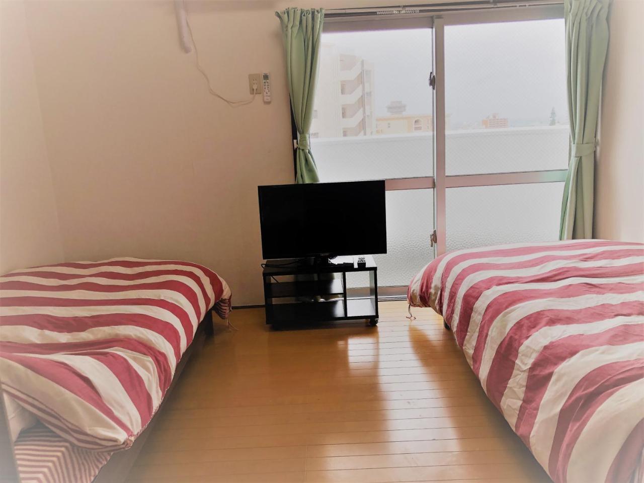 Sunset Hills Inn Naha Buitenkant foto